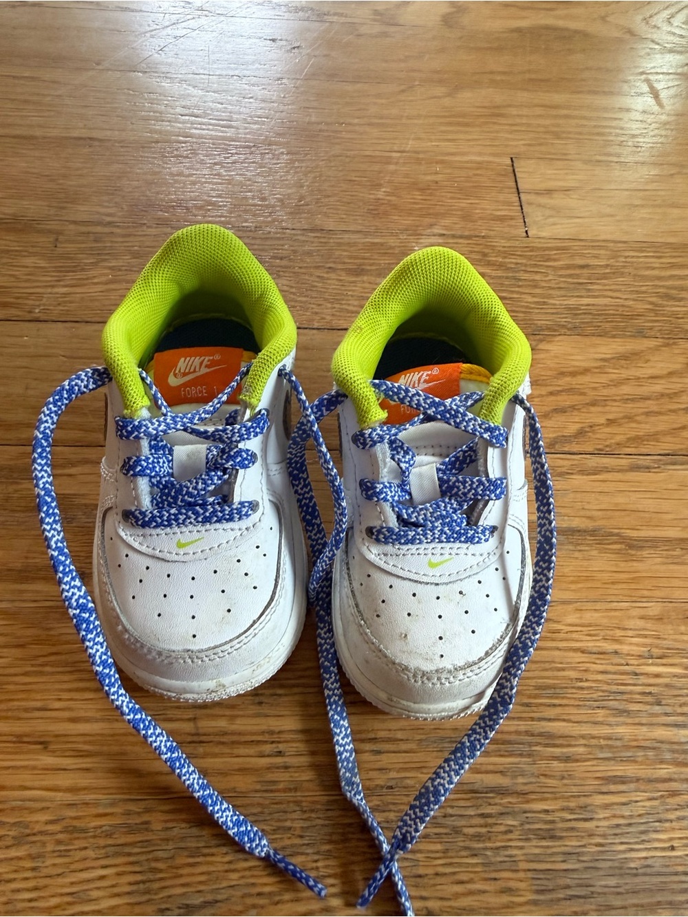 Nike Kids White Sneakers with Lime Green Lining and Blue Laces